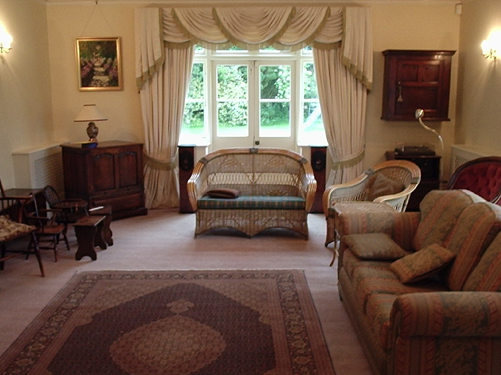 customer to the left  listening lounge (approx 6 by 10 metres). his home is worth over 500k. Click to enlarge